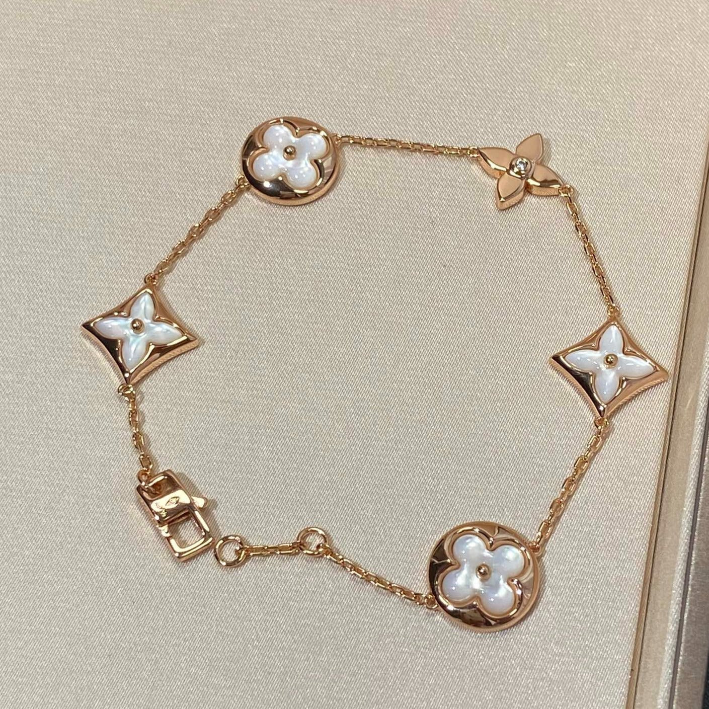 [Glow Jewelry]STAR AND SUN 5 MOTIF MOP PINK GOLD BRACELET