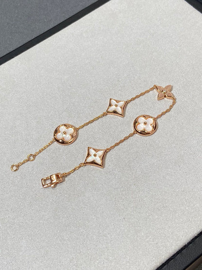 [Glow Jewelry]STAR AND SUN 5 MOTIF MOP PINK GOLD BRACELET
