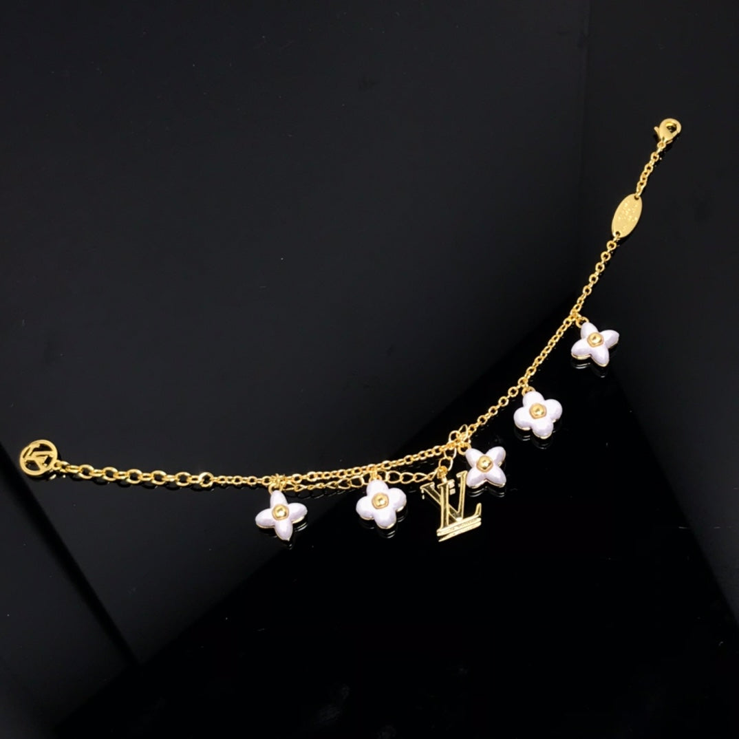 ¡®Glow Jewelry¡¯LOGO 6 MOTIF STAR AND SUN GOLD BRACELET