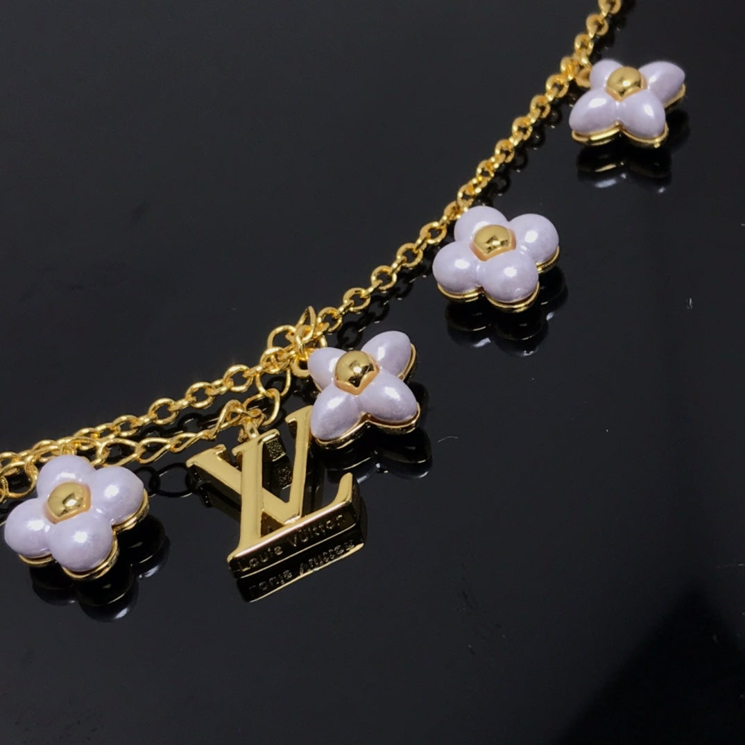 ¡®Glow Jewelry¡¯LOGO 6 MOTIF STAR AND SUN GOLD BRACELET